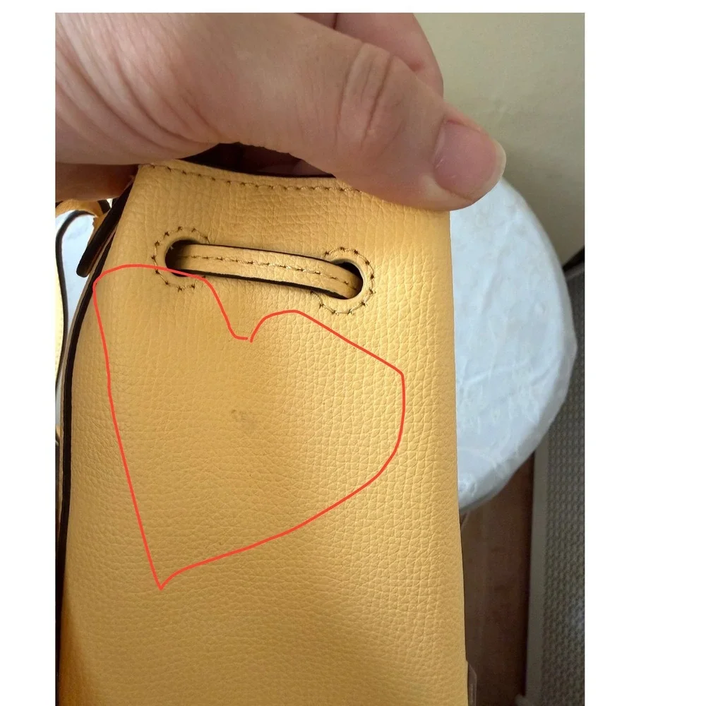 Kate Spade New York Yellow Pebbled Leather Drawstring Backpack Bag